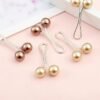 12764cac2670e052f71bf26c5e9c76e1_enhanced.jpg 12-Piece Pearl Hijab Brooch Pin Set